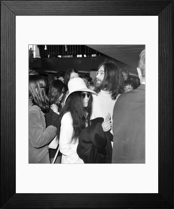Framed Print : Beatles singer songwriter John Lennon and wife Yoko Ono pictured at Heathrow today Framed Print : Beatles singer songwriter John Lennon and wife Yoko Ono pictured at Heathrow today