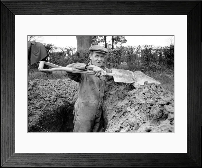 Framed Print : Is work wonderful?. Feature. Grave Diggers at work in the grave yard of Windlesham Church Framed Print : Is work wonderful?. Feature. Grave Diggers at work in the grave yard of Windlesham Church
