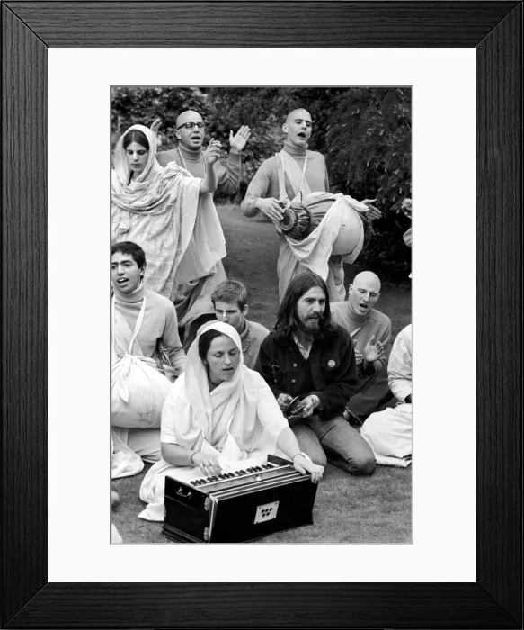 Framed Print : George Harrison of the Beatles pictured amongst the Buddhist American group Framed Print : George Harrison of the Beatles pictured amongst the Buddhist American group