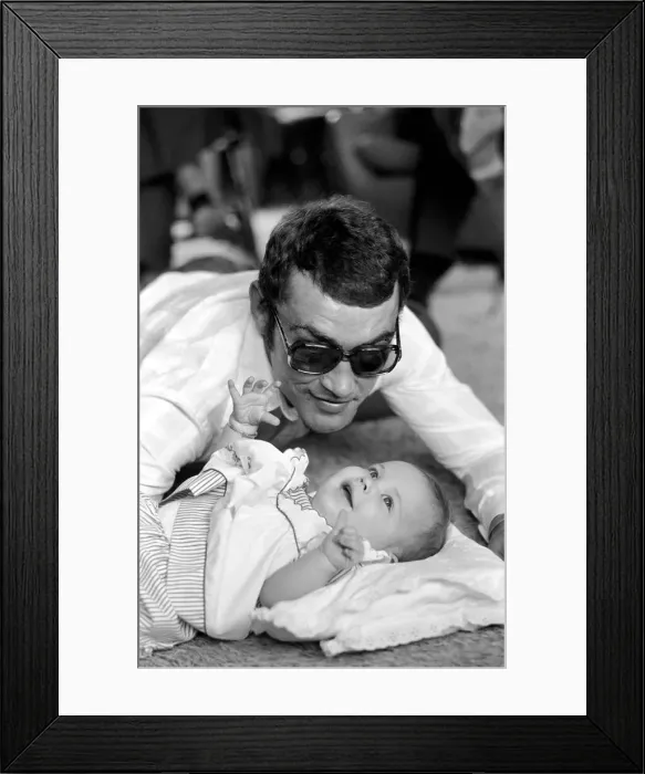 Framed Print : Boxer Alan Minter pictured at his Crawley Sussex home with his six month old baby Framed Print : Boxer Alan Minter pictured at his Crawley Sussex home with his six month old baby