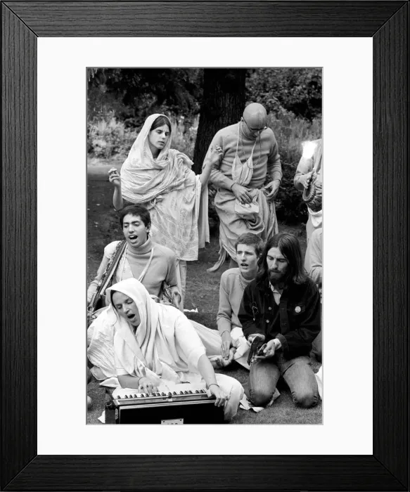 Framed Print : George Harrison of the Beatles pictured amongst the Buddhist American group Framed Print : George Harrison of the Beatles pictured amongst the Buddhist American group