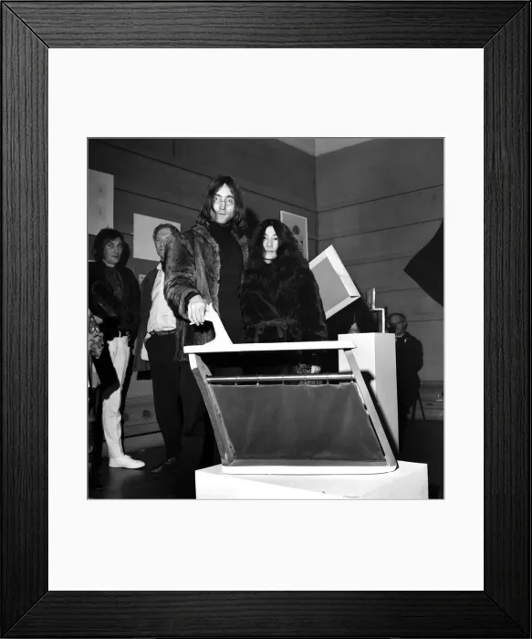 Framed Print : John Lennon and Yoko Ono, tonight to a room full of art students played on them a prank Framed Print : John Lennon and Yoko Ono, tonight to a room full of art students played on them a prank