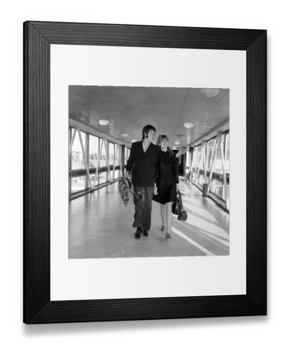 Framed Print : Paul McCartney of the Beatles and Jane Asher at Heathrow today