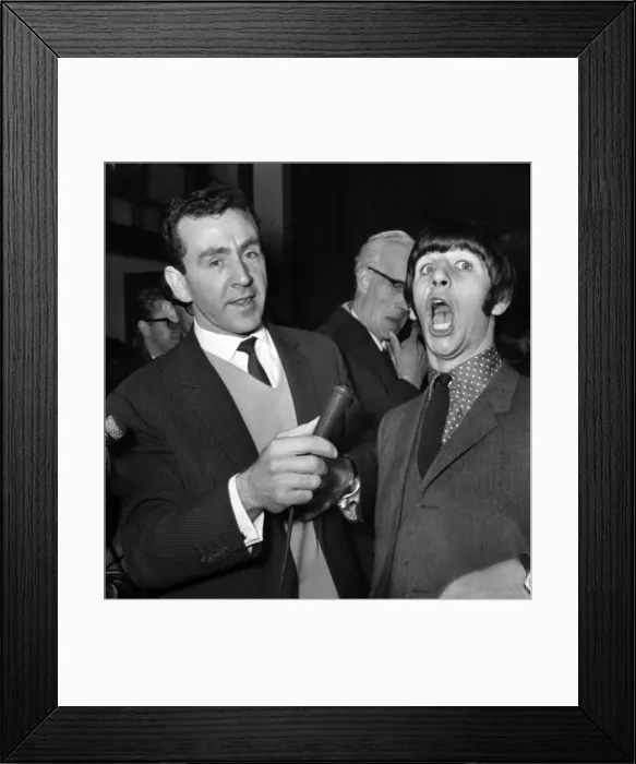 Framed Print : Beatles drummer Ringo Starr shows off his tonsils to the press before entering Framed Print : Beatles drummer Ringo Starr shows off his tonsils to the press before entering