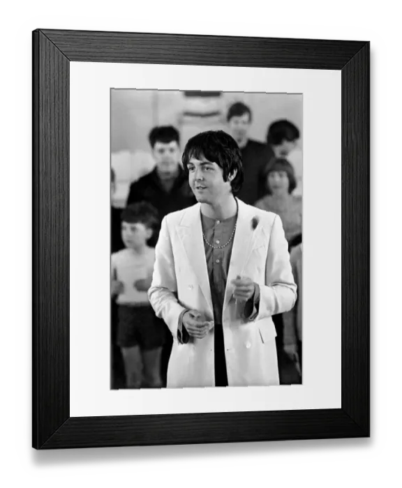 Framed Print : Beatles singer Paul McCartney conducts a brass band. July 1968 Y06397-001