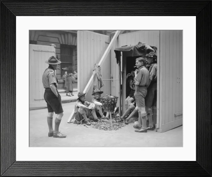 Framed Print : Coronation of King George VI. Boy scouts sit down for a cigarette as they await Framed Print : Coronation of King George VI. Boy scouts sit down for a cigarette as they await