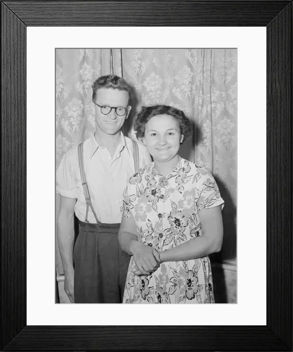 Framed Print : Husband and wife Mr and Mrs Higgins pose for the camera after giving their view