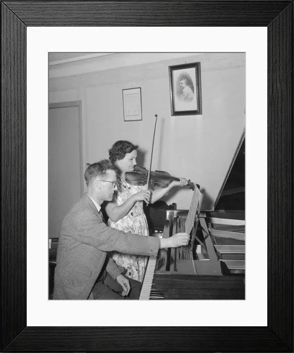 Framed Print : Husband and wife Mr and Mrs Higgins seen here making their own entertainment