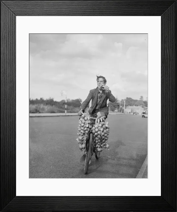 Framed Print : Mr Gallou Pierre seen here after just arriving in Bristol with his onion which he takes Framed Print : Mr Gallou Pierre seen here after just arriving in Bristol with his onion which he takes