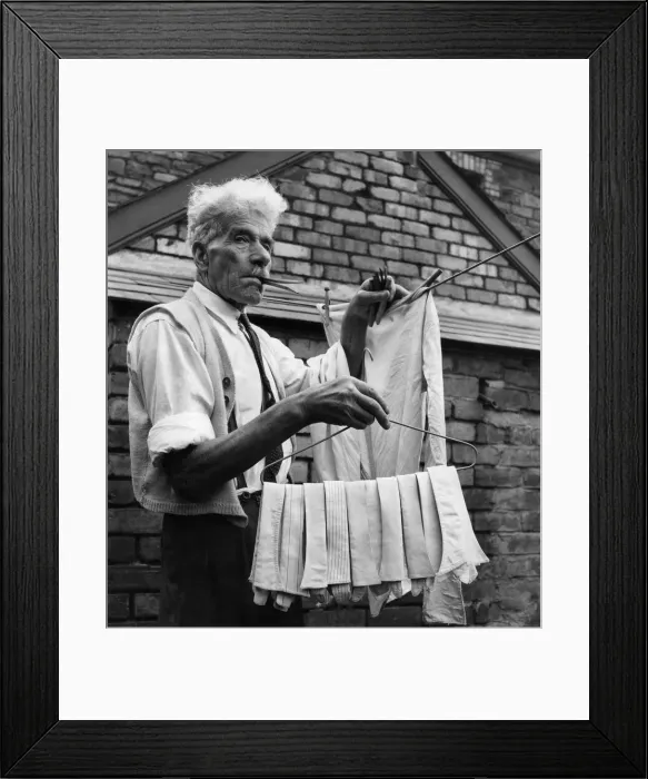 Framed Print : Mr. Ilerbert Tilling, aged 81, lives along in his terraced valley home in Pontypridd Framed Print : Mr. Ilerbert Tilling, aged 81, lives along in his terraced valley home in Pontypridd