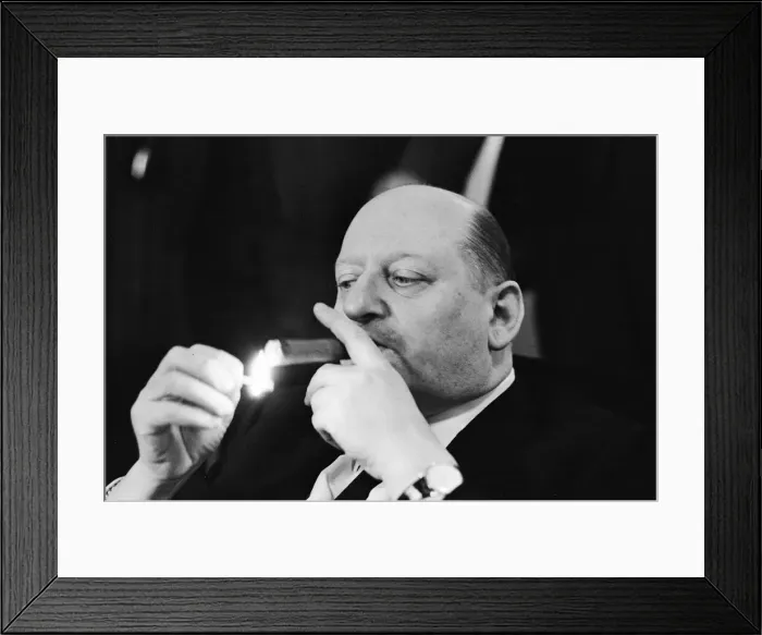 Framed Print : Media Mogul Lord Lew Grade lighting his cigar with a match. 24th January 1967