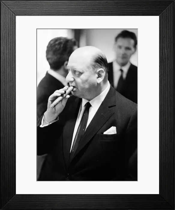 Framed Print : Media Mogul Lord Lew Grade poses for the camera smoking a cigar. 24th January 1967 Framed Print : Media Mogul Lord Lew Grade poses for the camera smoking a cigar. 24th January 1967
