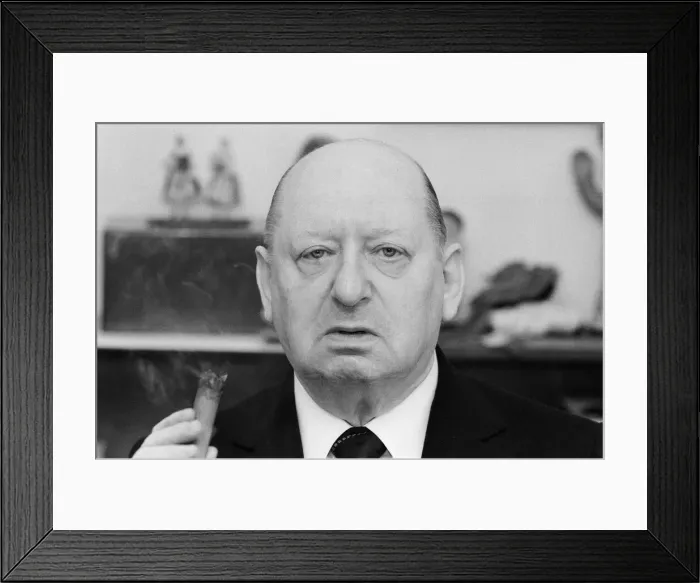 Framed Print : Media Mogul Lew Grade, head of ATV television, smoking of one of his trademark cigars Framed Print : Media Mogul Lew Grade, head of ATV television, smoking of one of his trademark cigars