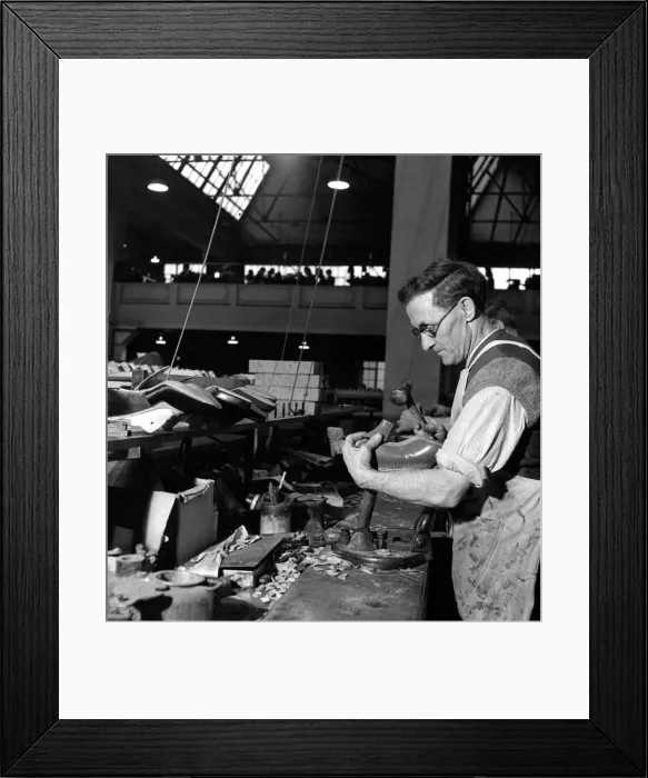 Framed Print : Attaching a Beech wood heel to a womens shoe after the strict war regulations banned Framed Print : Attaching a Beech wood heel to a womens shoe after the strict war regulations banned