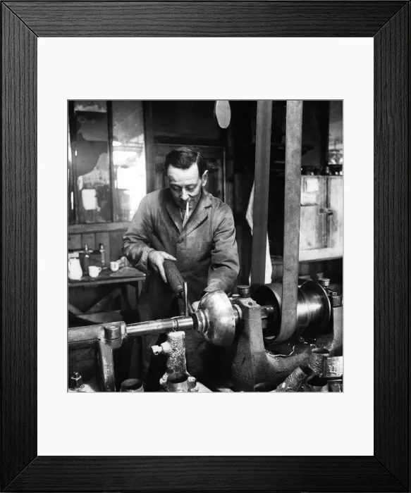 Framed Print : A circular sheet of brass being made into a bowl on a lathe in Birmingham Framed Print : A circular sheet of brass being made into a bowl on a lathe in Birmingham