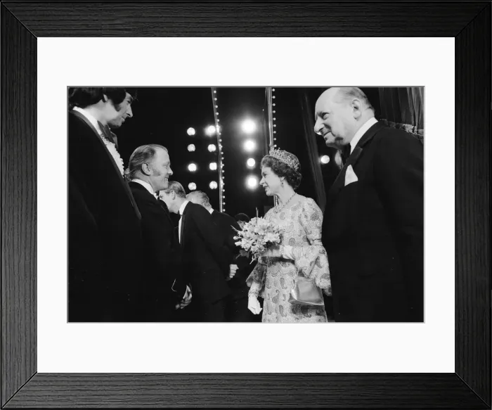 Framed Print : Her Majesty Queen Elizabeth II, escorted by Media mogul Lew Grade (right) Framed Print : Her Majesty Queen Elizabeth II, escorted by Media mogul Lew Grade (right)