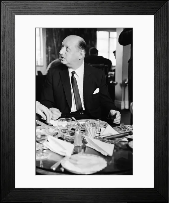 Framed Print : Media Mogul Lord Lew Grade seated at the table at a dinner party. 24th January 1967