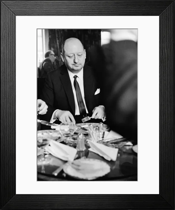 Framed Print : Media Mogul Lord Lew Grade seated at the table at a dinner party. 24th January 1967 Framed Print : Media Mogul Lord Lew Grade seated at the table at a dinner party. 24th January 1967