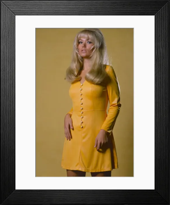 Framed Print : Model wearing yellow leatherette dress November 1969