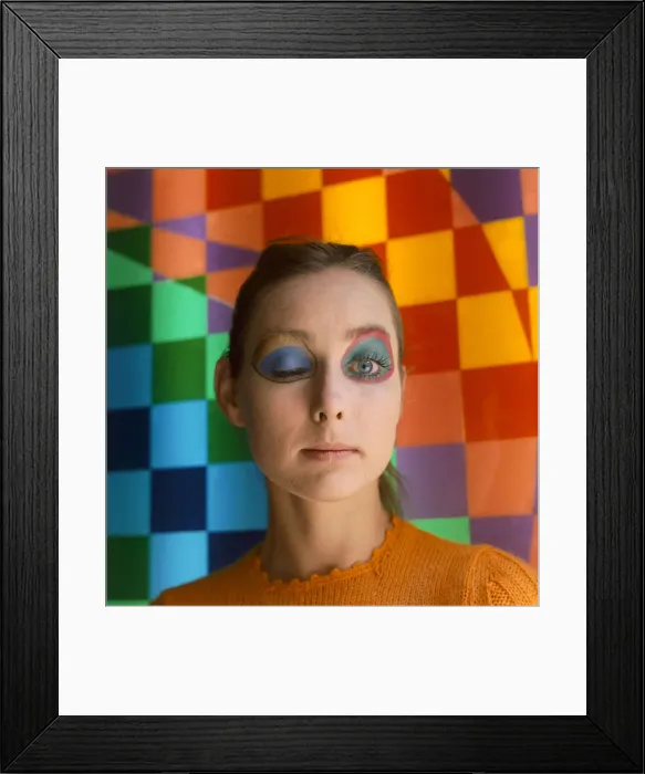 Framed Print : Make up artist Paul Richards of Eylure demonstrates his panda look on model Penelope Tree