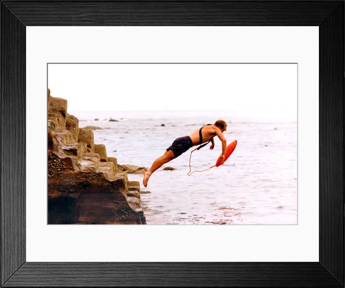 Framed Print : This lifeguard leaps into action during an exercise in July 1995 Framed Print : This lifeguard leaps into action during an exercise in July 1995