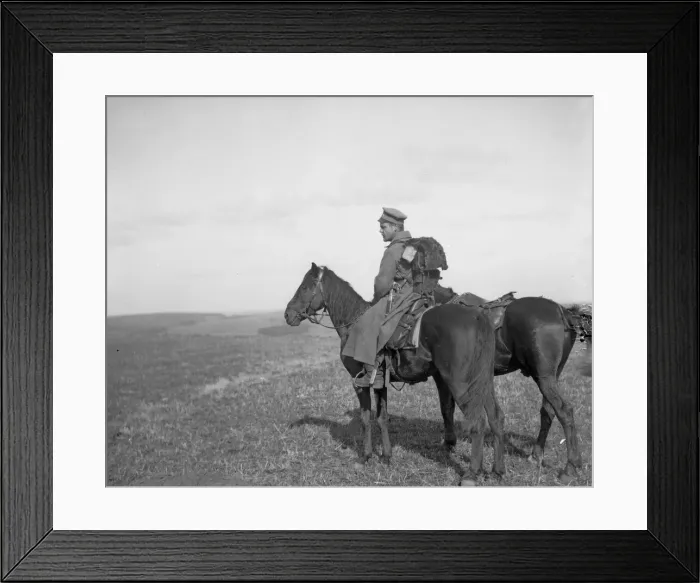 Framed Print : A lone Russian soldier stands by a mass grave in Galicia where the bodies of fifty Framed Print : A lone Russian soldier stands by a mass grave in Galicia where the bodies of fifty