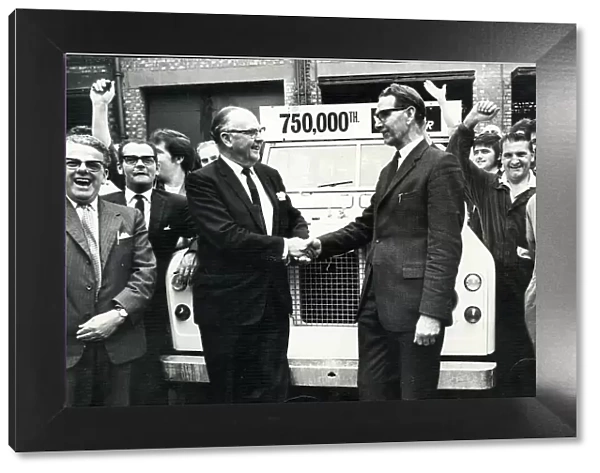 Sir George Farmer congratulating production manager Mr James Lawrence as the 750