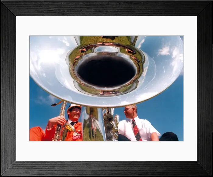 Framed Print : Bandsman Einar Torsvik from Norway chats with Keith Miller who plays for Pegswood Brass