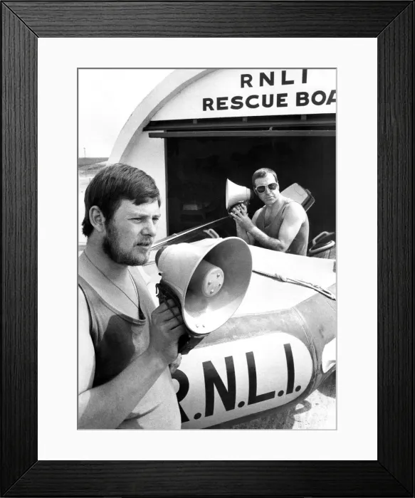 Framed Print : Lifeguards James Elwood (left) and Thomas Todd with megaphones which can pick up cries Framed Print : Lifeguards James Elwood (left) and Thomas Todd with megaphones which can pick up cries