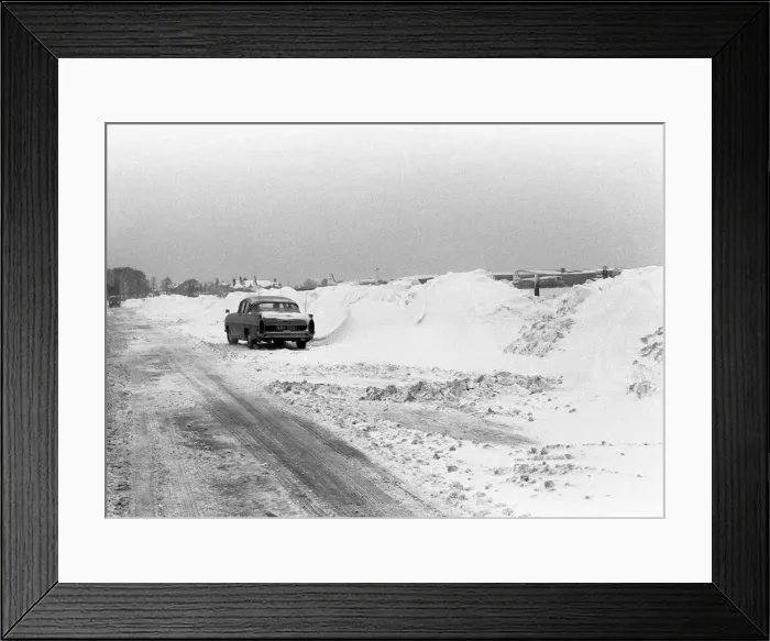 Framed Print : A snowy road next to Coventry airport, Baginton, Coventry. 3rd January 1963