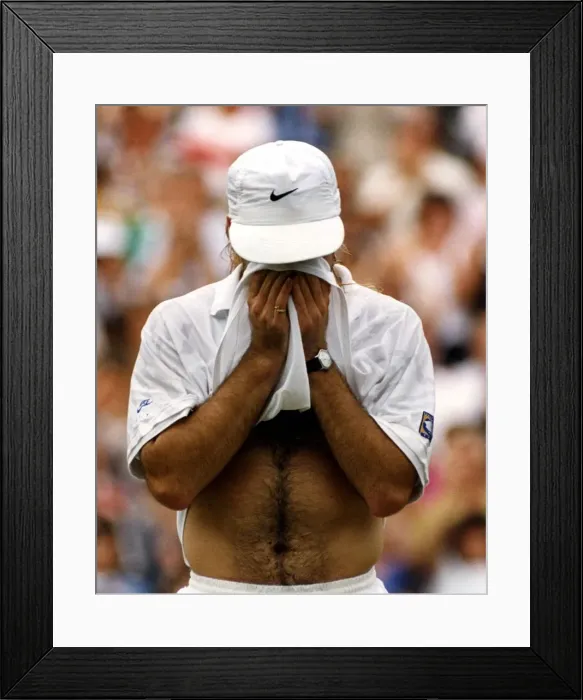 Framed Print : Andre Agassi emotional after beating Goran Ivanisevic in the Mens Singles Final