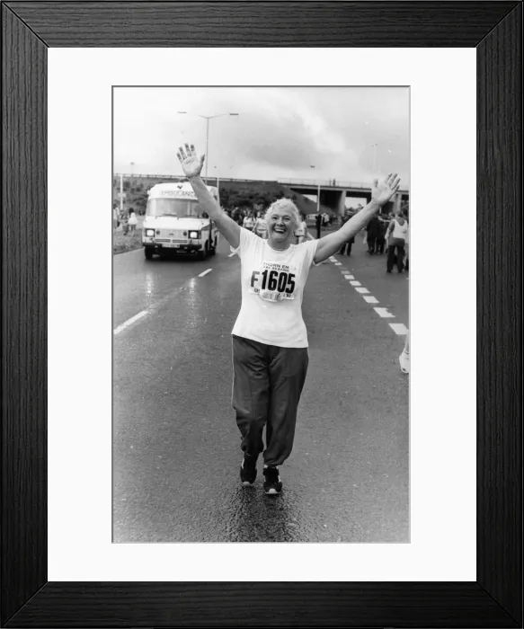 Framed Print : The Great North Run 27 June 1982 - Arms aloft runner Gladys Humpsih, 70 Framed Print : The Great North Run 27 June 1982 - Arms aloft runner Gladys Humpsih, 70