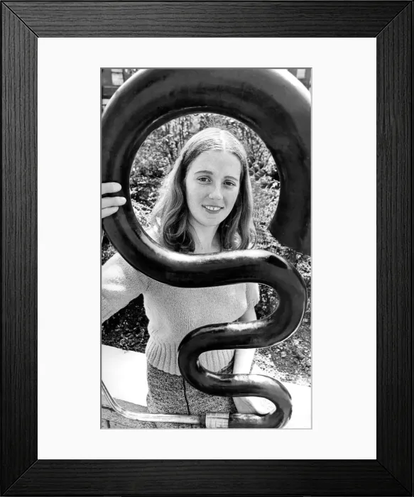 Framed Print : Secretary Ann Roger got to grips with an early musical instrument called the Serpent Framed Print : Secretary Ann Roger got to grips with an early musical instrument called the Serpent