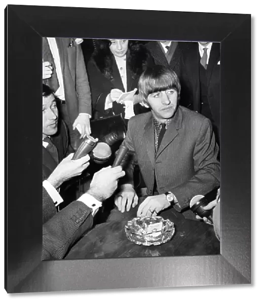 Beatles drummer Ringo Starr speaks to the press before entering the University College