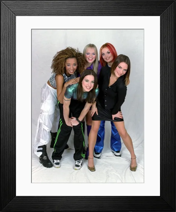 Framed Print : British all girl pop group The Spice Girls pose for a group photograph in the Daily Framed Print : British all girl pop group The Spice Girls pose for a group photograph in the Daily