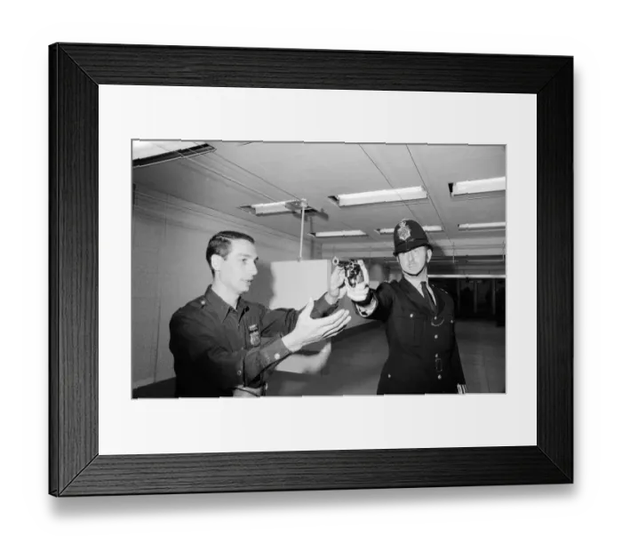 Framed Print : English police officers tour a firing range at a New York Police Department in America Framed Print : English police officers tour a firing range at a New York Police Department in America