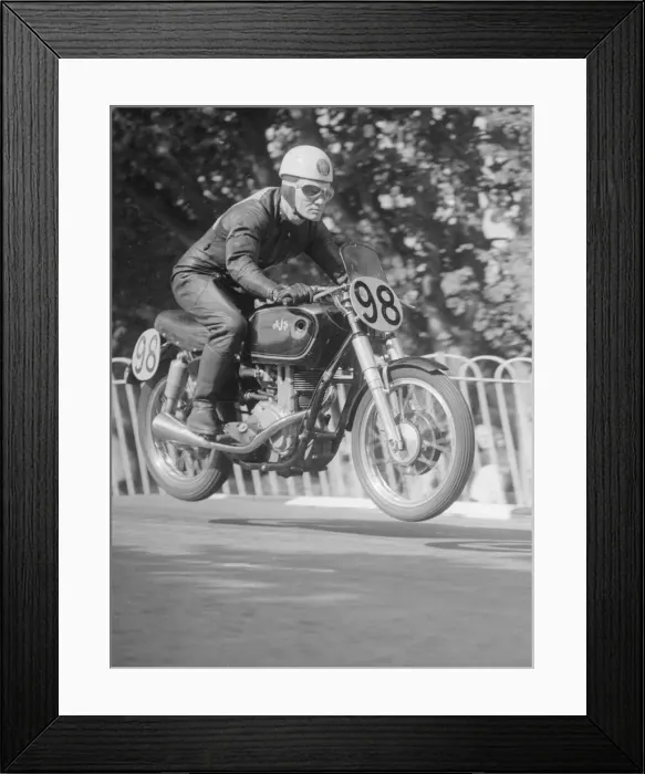 Framed Print : 1952 Isle of Man Grand Prix 10th September 1952 R McIntyre takes a jump