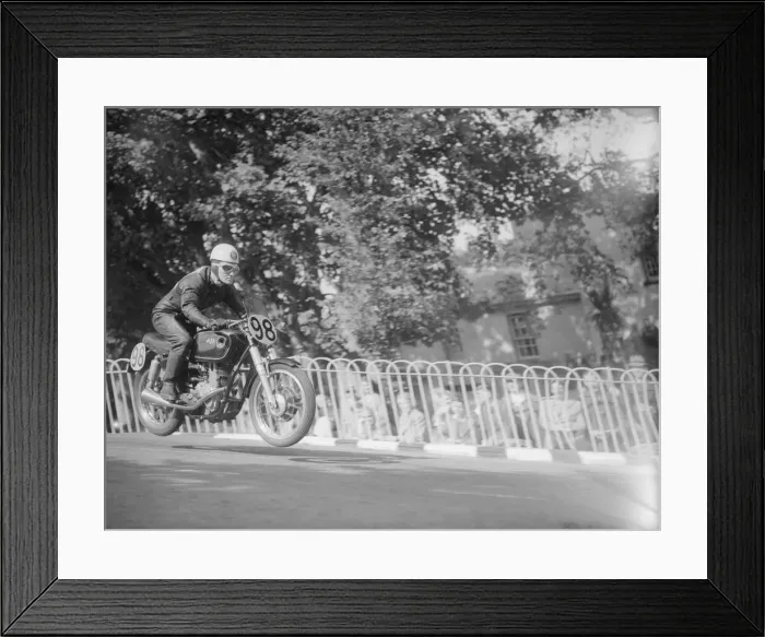 Framed Print : 1952 Isle of Man Grand Prix 10th September 1952 R McIntyre takes a jump