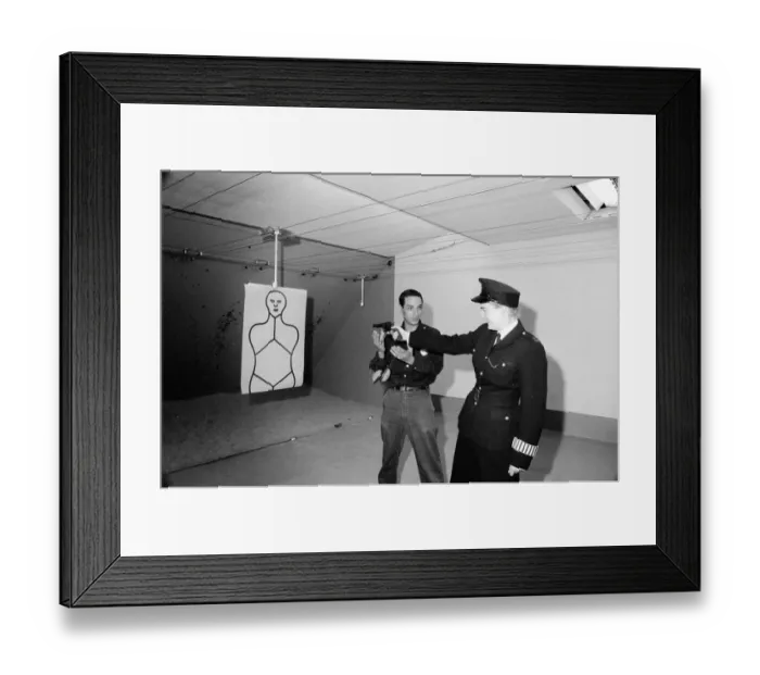 Framed Print : English police officers tour a firing range at a New York Police Department in America