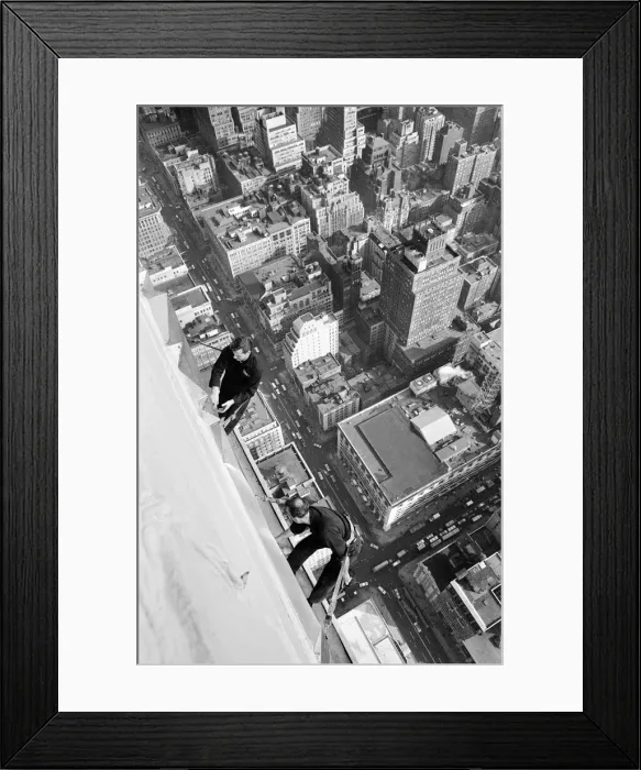 Framed Print : Workmen busy cleaning windows 1000 ft up the Empire State building in Manhatten New York Framed Print : Workmen busy cleaning windows 1000 ft up the Empire State building in Manhatten New York