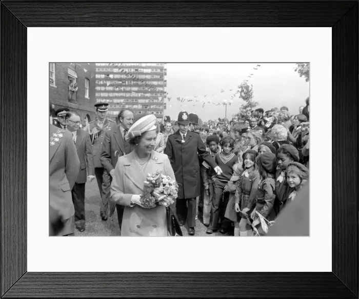 Framed Print : Queen Elizabeth II rocked with laughter at Pepys Estate, Deptford, today Framed Print : Queen Elizabeth II rocked with laughter at Pepys Estate, Deptford, today