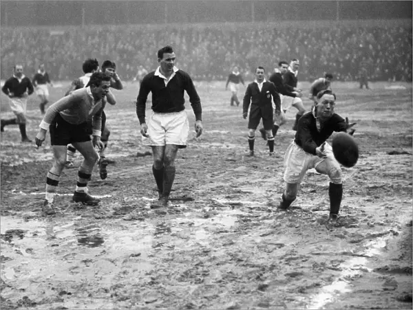The safe hands of Syddall ( Swinton) gather the ball during a rugby league match taking