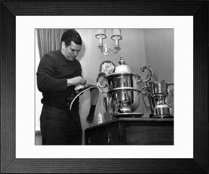 Framed Print : Putting a shine on one of his trophies is British wrestler Count Bartelli in his Crewe Framed Print : Putting a shine on one of his trophies is British wrestler Count Bartelli in his Crewe