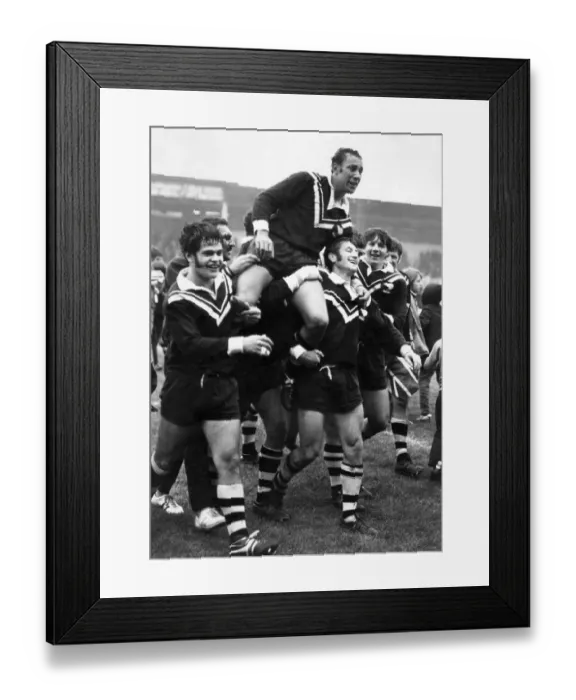 Framed Print : New Zealand players carry off their captain Roy Christian after beating Great Britain in