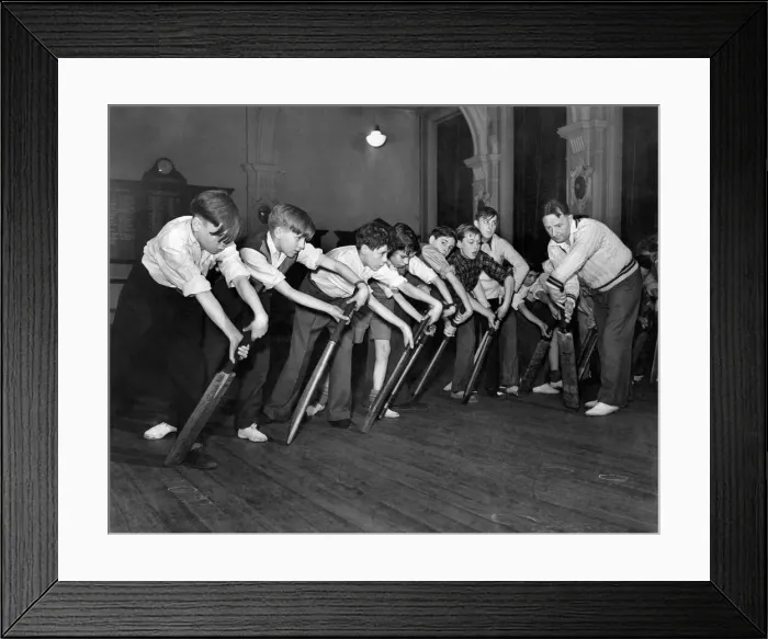 Framed Print : Cricket Coaching. Boys follow Mr. Moseleys example in this forward shot Framed Print : Cricket Coaching. Boys follow Mr. Moseleys example in this forward shot