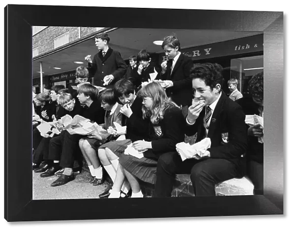 Childrens at St Augustines secondary school in Hugton, eat sandwiches