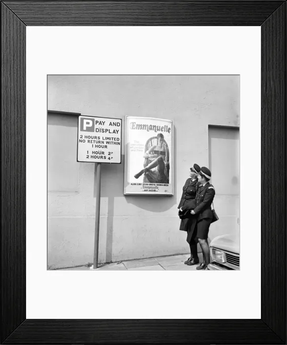 Framed Print : Cinema Manager at A. B. C. Cinemax Cheltenham covers up the bare boobs