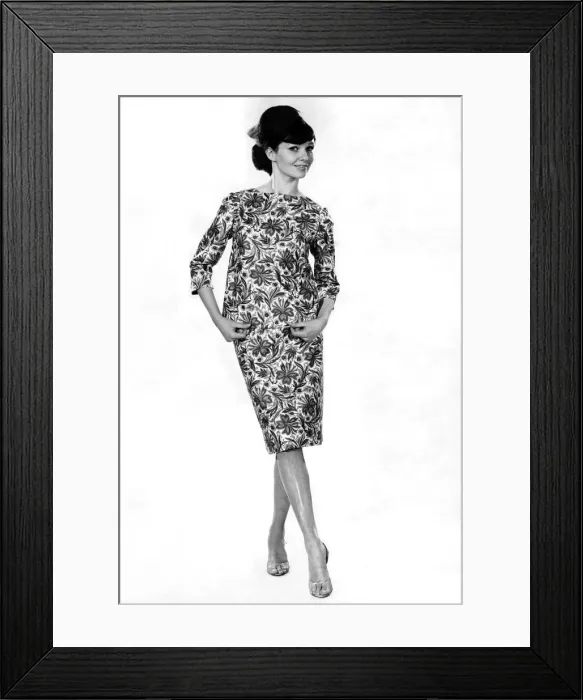 Framed Print : Model Merriel Weston wearing a floral patterned top and matching skirt. May 1964 P007544 Framed Print : Model Merriel Weston wearing a floral patterned top and matching skirt. May 1964 P007544