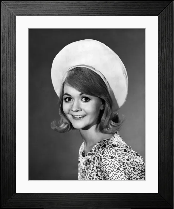Framed Print : Model wearing large hat with patterned top August 1964 P007540 Framed Print : Model wearing large hat with patterned top August 1964 P007540