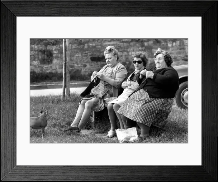 Framed Print : Three women with larger figures seen here knitting whilst their children play in a poorer Framed Print : Three women with larger figures seen here knitting whilst their children play in a poorer